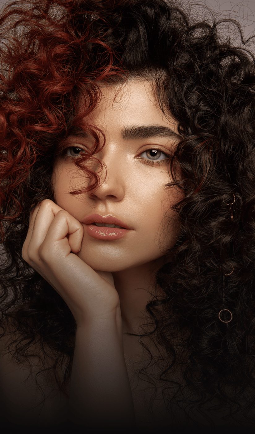 Portrait with curly hair, sharp after unblur