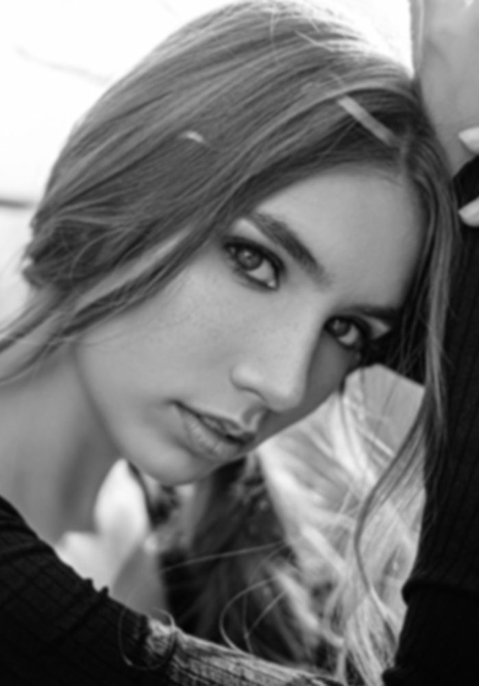 Low-resolution black and white portrait before